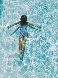 High angle view of girl in swimming pool