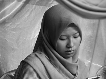 Close-up portrait of young woman