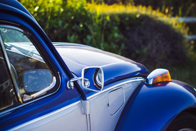 Close-up of blue car