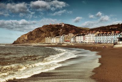 Scenic view of beach against sky