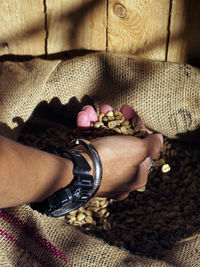 High angle view of man hand on table