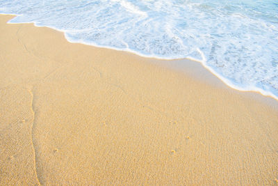 High angle view of surf on beach