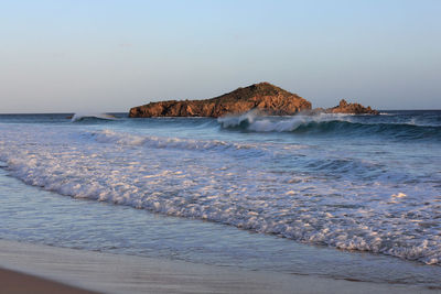 Scenic view of sea against clear sky