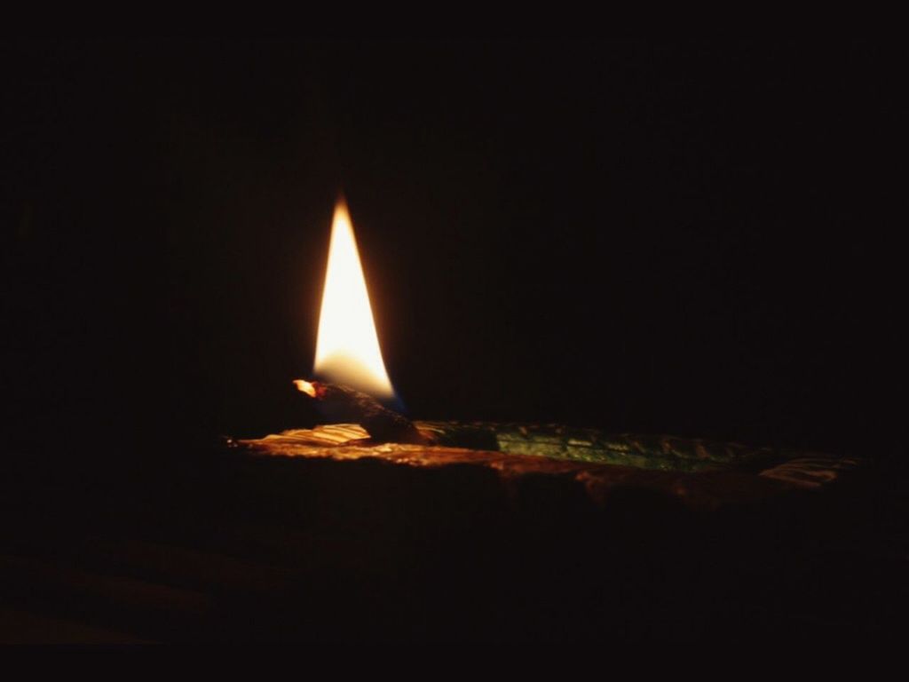 flame, burning, fire - natural phenomenon, heat - temperature, glowing, night, black background, no people, dark, illuminated, close-up, darkroom, oil lamp, outdoors, diya - oil lamp