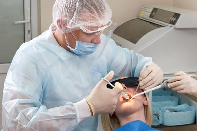 Woman getting dental treatment