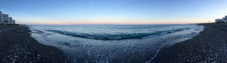 View of calm sea at sunset