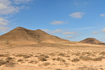 Scenic view of desert against sky