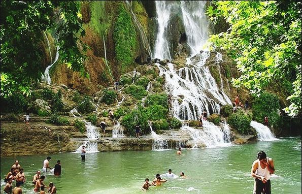 water, leisure activity, lifestyles, large group of people, men, tree, person, vacations, motion, enjoyment, beauty in nature, tourist, waterfall, nature, mixed age range, medium group of people, tourism, togetherness, scenics