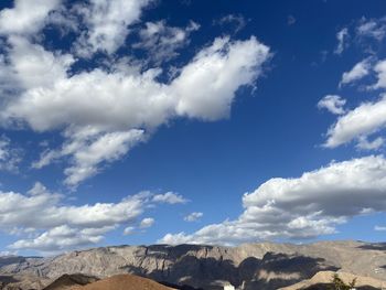 Low angle view of rock formation against sky