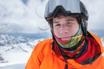 Portrait of mid adult man in snow