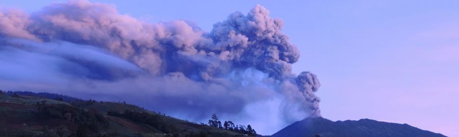 Low angle view of majestic mountains against sky