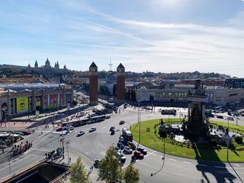 High angle view of street and buildings against sky