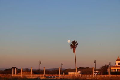 Scenic view of sea against clear sky during sunset