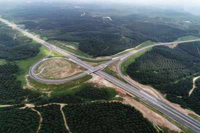 High angle view of road amidst agricultural landscape