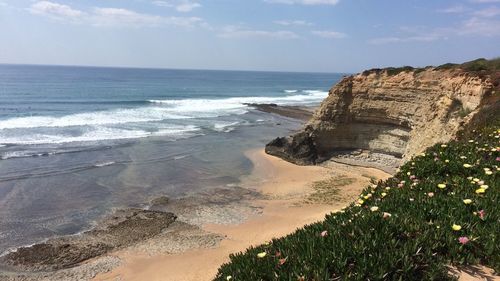 Scenic view of beach against sky