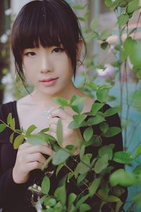 Portrait of girl with plants