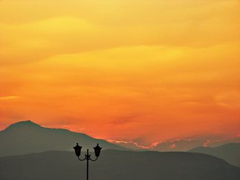 Scenic view of mountains at sunset