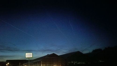 Low angle view of building against sky at night