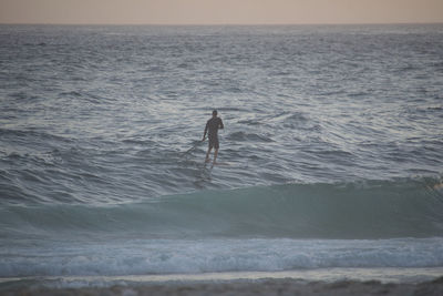 Man surfing in sea