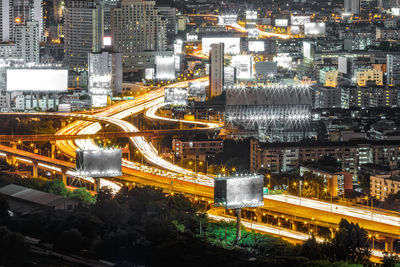 High angle view of illuminated cityscape at night