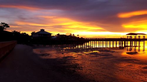 Scenic view of sea against orange sky