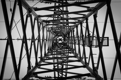 Low angle view of metal structure against sky