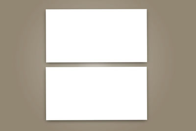 Low angle view of empty paper against white background