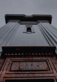 Low angle view of old building against sky