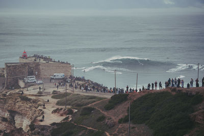 High angle view of crowd on seashore