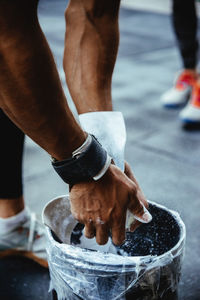 Low section of man working in water