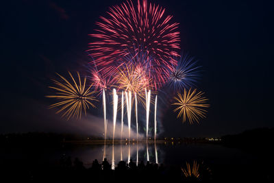 Firework display at night