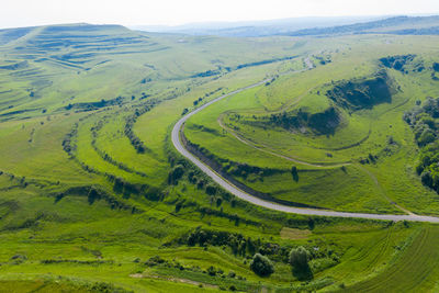Above view of countryside road, aerial drone view