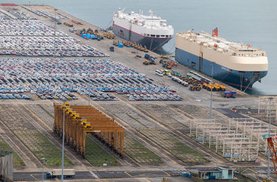 High angle view of boats moored at harbor