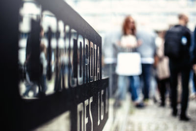 Text on signboard in city