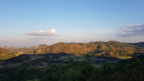 Scenic view of landscape against sky during sunset