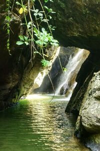 Scenic view of river amidst rocks