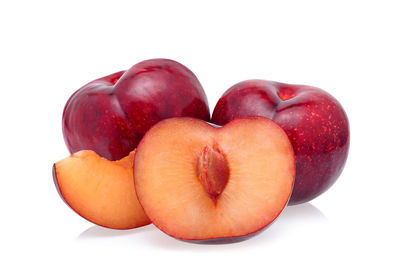 Close-up of apples against white background