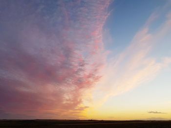 Scenic view of silhouette landscape against sky during sunset