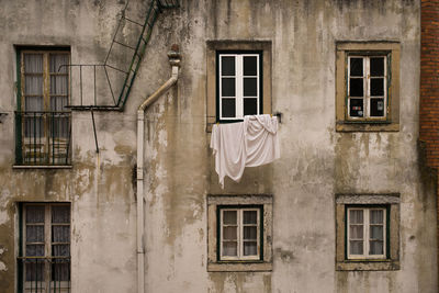 Cloth hanging on window of building