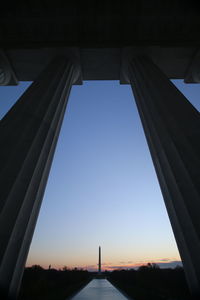 Low angle view of built structure against clear blue sky