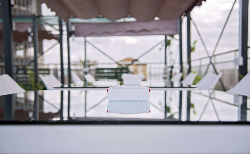 Close-up of telephone booth on table