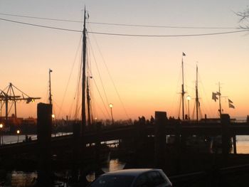 Silhouette of power lines at sunset