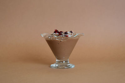 Close-up of ice cream in glass on table