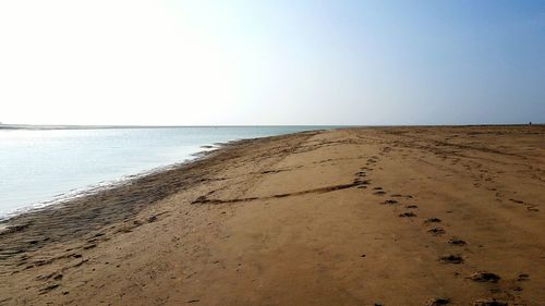 Scenic view of sea against clear sky