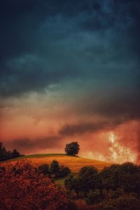 Scenic view of landscape against cloudy sky