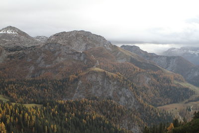 Scenic view of landscape and mountains against sky