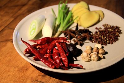 Close-up of various food in plate on table