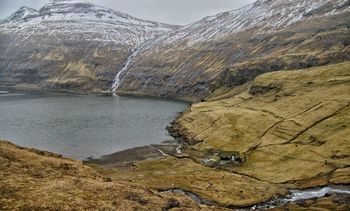 Scenic view of lake by mountains