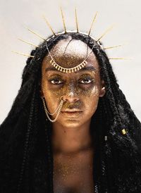 Close-up portrait of woman with face paint