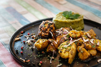 High angle view of food served in plate on table